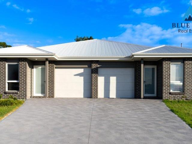 Modern Duplex Opportunity in Fast Growing Bellbird Buy One or Secure Both!