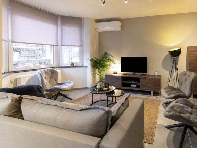 Modern duplex appartement met 2 slaapkamers en parkeerplaats te huur op toplocatie in Maasmechelen