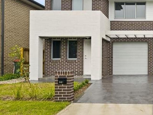 Modern Duplex in Convenient Riverstone Location