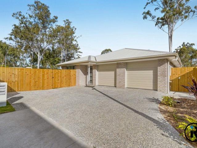 Modern Duplex Living with a Spacious Backyard