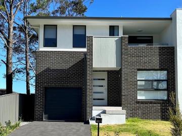 Modern Duplex Living! Reduced Price Don't Miss Out!