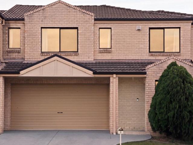 Modern Duplex with Spacious Interiors and Outdoor Entertaining Deck
