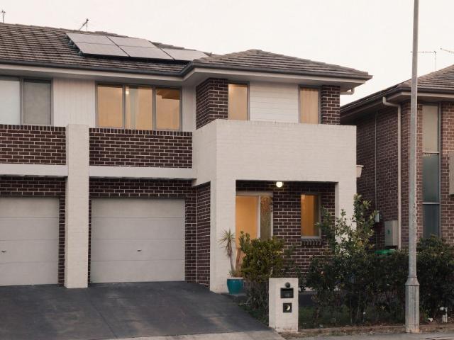 Modern Duplex with Spacious Interiors and Solar Powered Efficiency