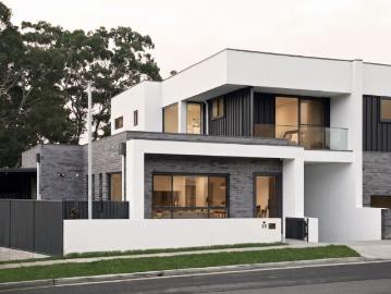 Modern Duplex with Pool and Expansive Living Spaces in Prime Location