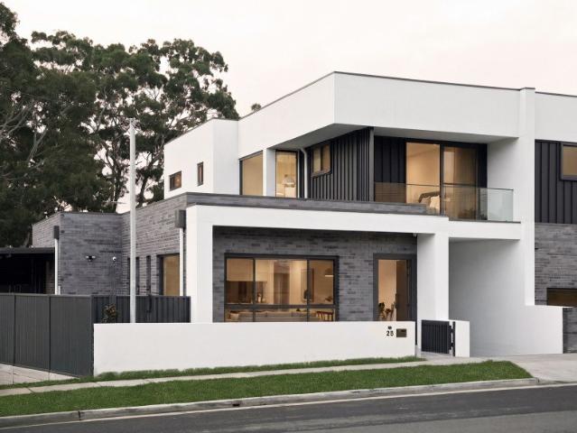 Modern Duplex with Pool and Expansive Living Spaces in Prime Location
