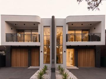 Modern Elegance Meets Architectural Brilliance in This Stunning Duplex