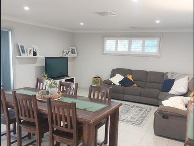 MODERN EXECUTIVE THREE BEDROOM BRICK HOME