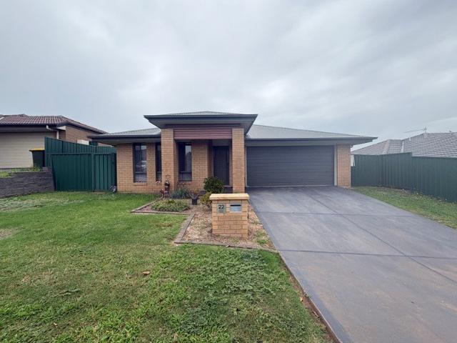 Modern Four Bedroom Brick & Tile Home