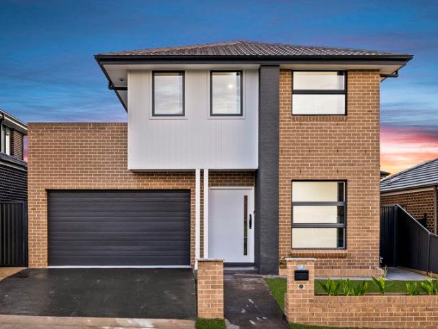 MODERN, FOUR BEDROOM, FAMILY RESIDENCE IN IDEAL LOCATION