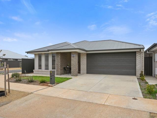 Modern Four Bedroom Home Designed for Easy Living