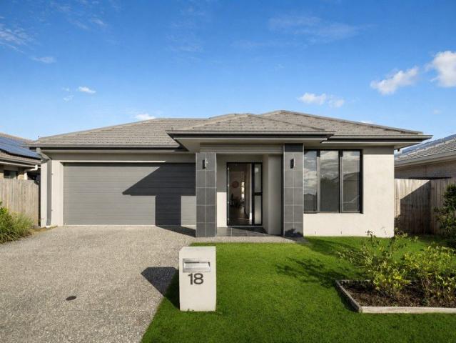 Modern Four Bedroom Home Designed for Easy Living