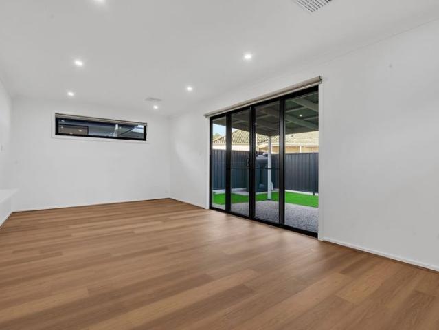 Modern Four Bedroom Home Designed for Family Living