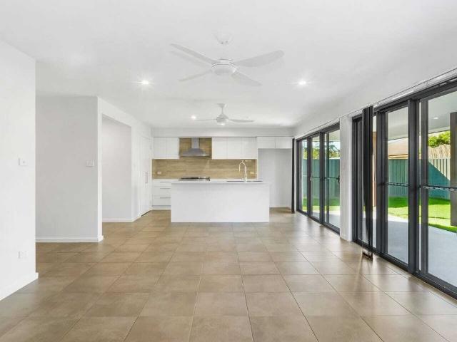 MODERN FOUR BEDROOM HOME IN SANDY BEACH