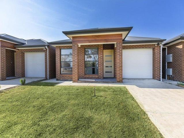 Modern Four Bedroom Home with Easy Care Living