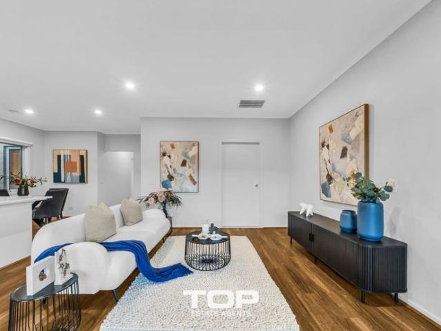 Modern Four Bedroom Living in Prestigious Five Farms Estate!