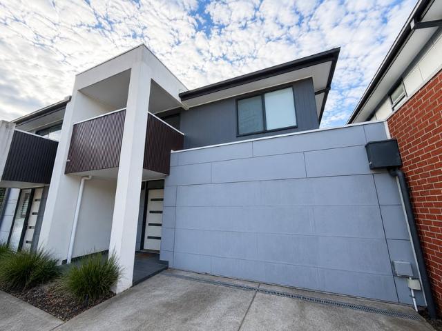 MODERN FOUR BEDROOM TOWNHOUSE IS HERE FOR YOU!