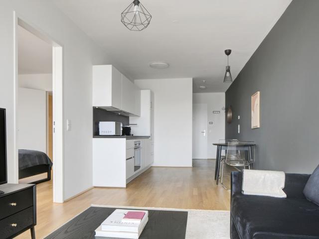 Modern Favoriten 1BR w/ Gym & Elevator, steps to Metro