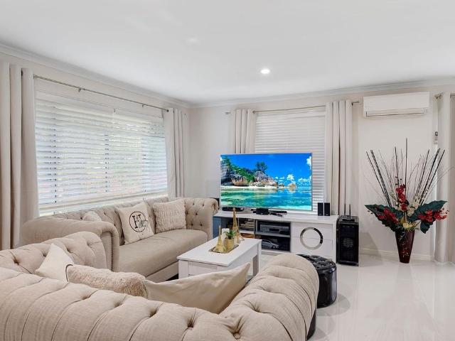 Modern Family Comfort Meets Prime Forest Lake Convenience
