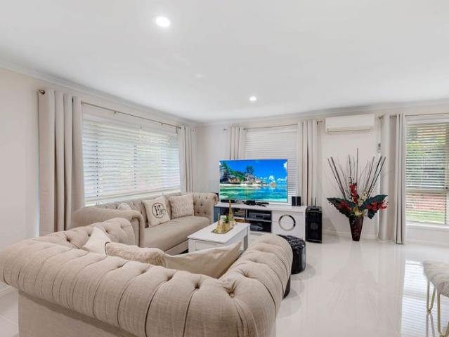 Modern Family Comfort Meets Prime Forest Lake Convenience