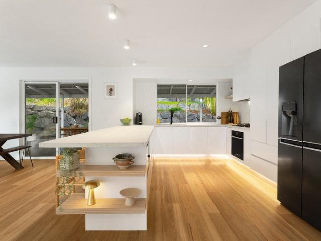 Modern family entertainer enveloped by vibrant greenery