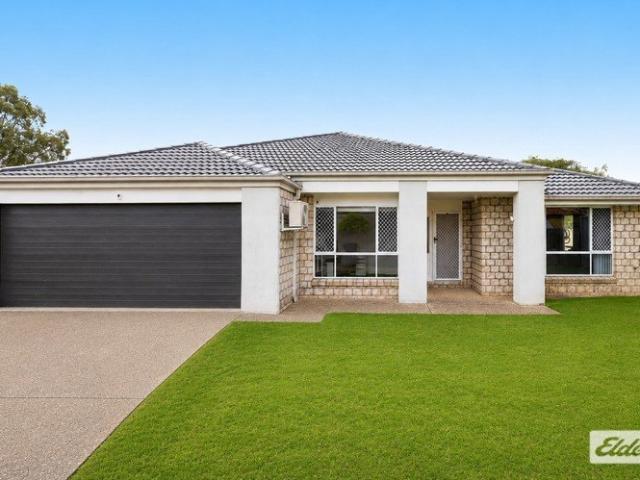 MODERN FAMILY ENTERTAINER WITH HEATED POOL, OUTDOOR KITCHEN & INCREDIBLE LIFESTYLE APPEAL!