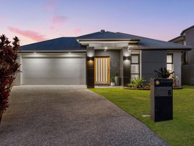 Modern Family Entertainer with Pool & Multiple Living Areas!