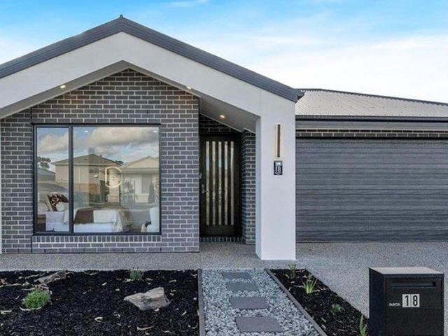 MODERN FAMILY HOME IN MADDINGLEY