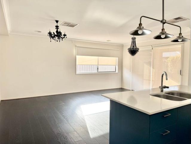 Modern Family Home in Manor Lakes!