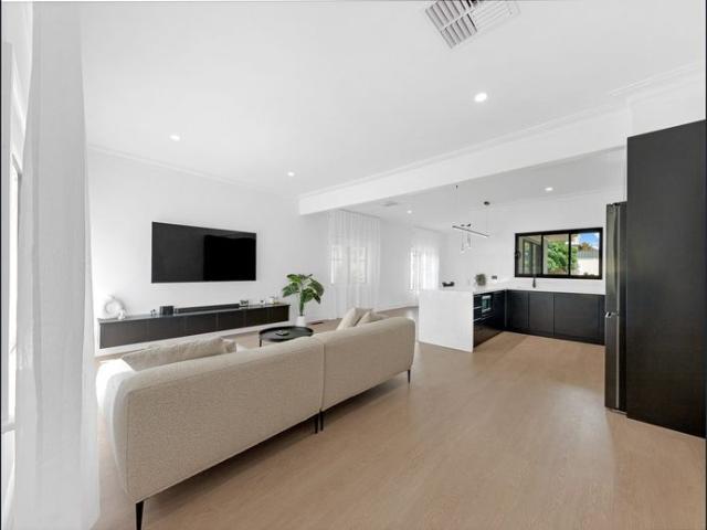 Modern Family Home In The Heart of Town!