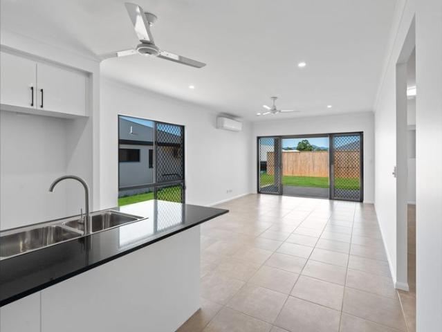 Modern Family Home Offering Style, Comfort & Low Maintenance Living!