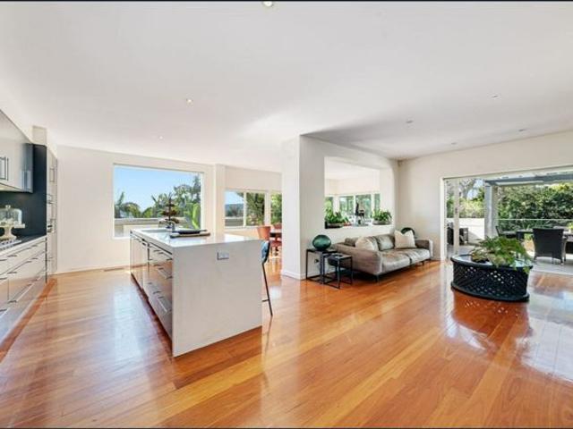 MODERN FAMILY HOME WITH WATER VIEWS ON CIRCA 980SQM