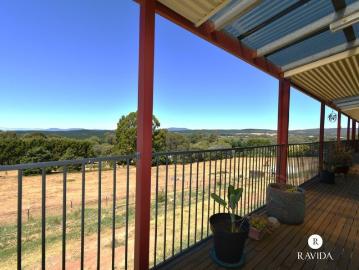 Modern Family Home with Acres to work with!