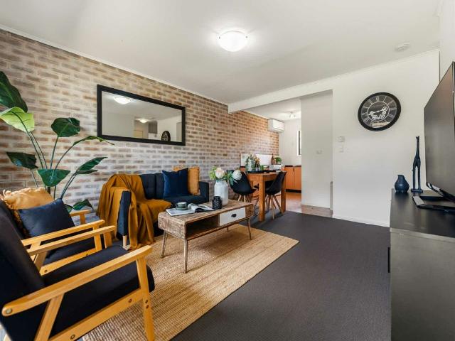 Modern Family Home with Air Conditioning & Spacious Backyard