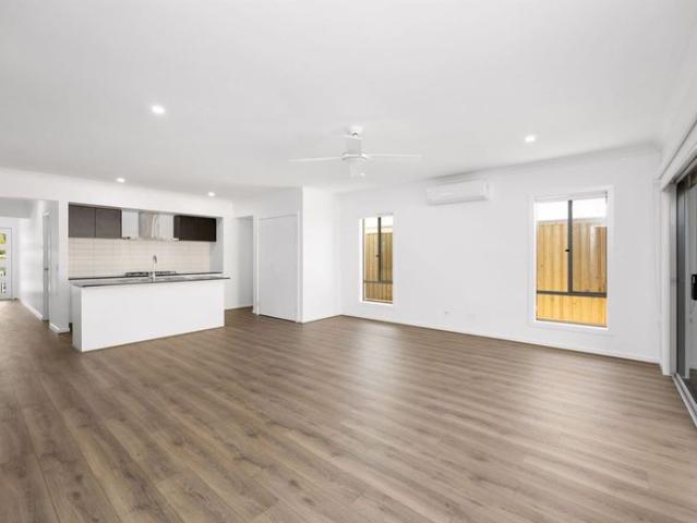 MODERN FAMILY HOME WITH MEDIA ROOM IN PRIME JOYNER LOCATION