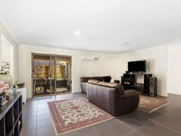 Modern Family Home with Multiple Living Areas in Quiet Brassall Location