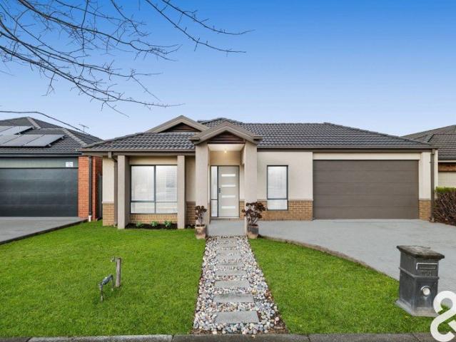 Modern Family Living with a Study, Large Deck, and Generous Backyard