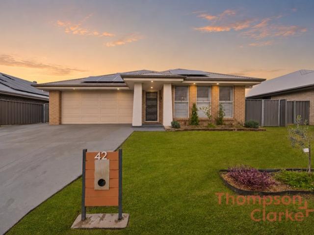 MODERN FAMILY LIVING WITH A RESORT STYLE ENTERTAINING