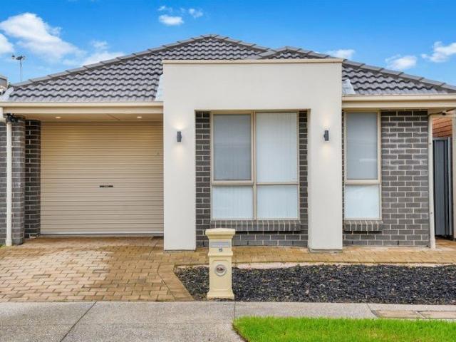 Modern Family Living with Courtyards, Two Living Zones & a Spacious Backyard