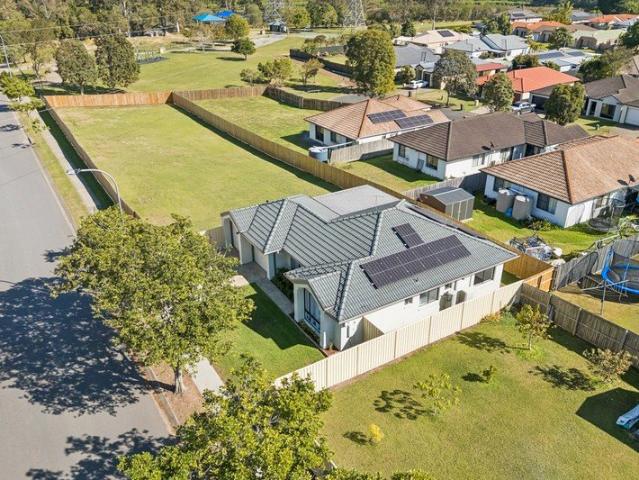 Modern Family Living with Exceptional Side Access & A Spacious Backyard