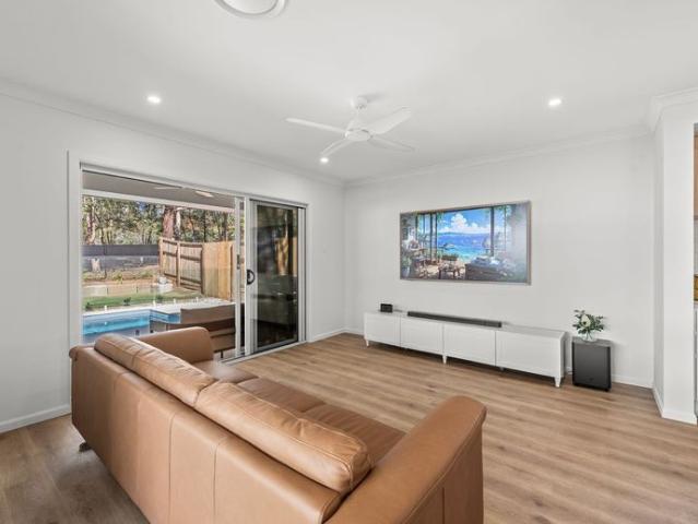 Modern Family Living with Pool and Ducted Comfort in Moggill