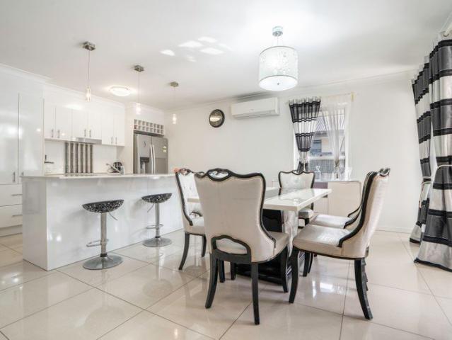 Modern Family Living with Poolside Entertaining in a Prime Location