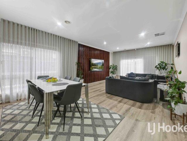 Modern Family Living with Stylish Renovations & Move In Ready Comfort