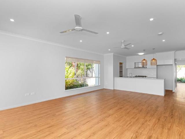 Modern Family Living with Theatre Room in Sought After Bushland Beach