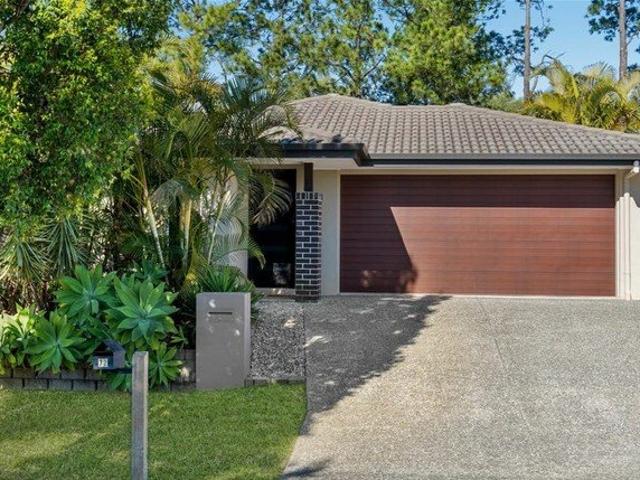 Modern Family Living with Tropical Outdoor Charm in the Heart of Doolandella
