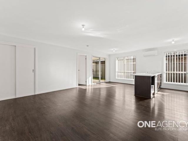 MODERN FAMILY LIVING BACKING ONTO PEACEFUL ROBINS CREEK