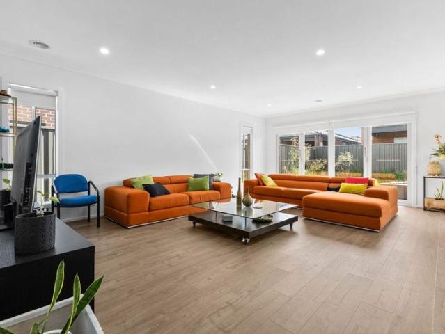 Modern Family Living in the Heart of Clyde North Powered with Solar