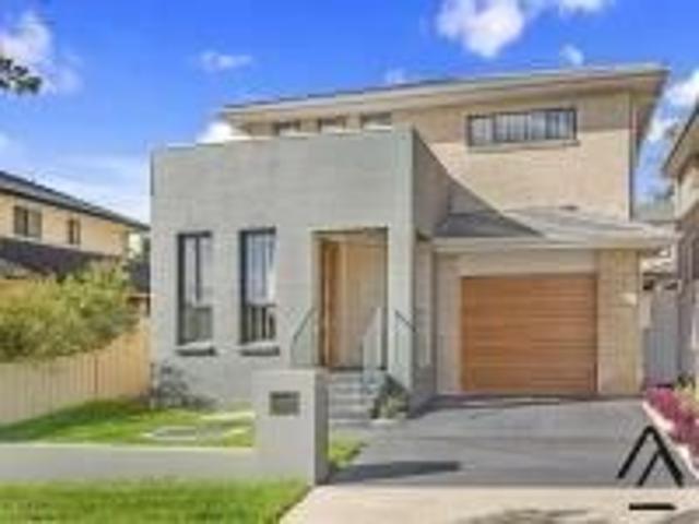 MODERN FAMILY LIVING IN THE HEART OF HAMMONDVILLE