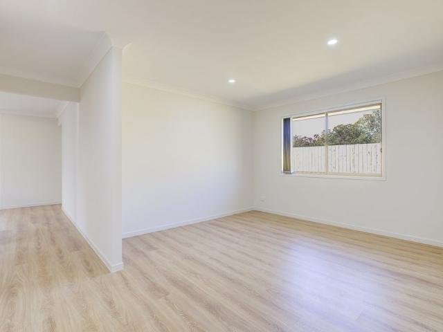 Modern Family Living in the Sought After Camelot Estate