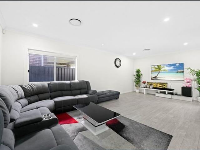 Modern Family Living in a Prime Catherine Field Location