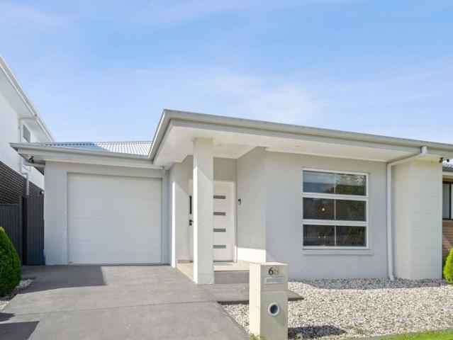 Modern Family Living in a Prime Catherine Field Location
